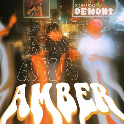 AMBER By Unusual Demont's cover