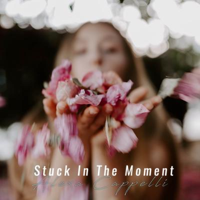 Stuck In The Moment's cover