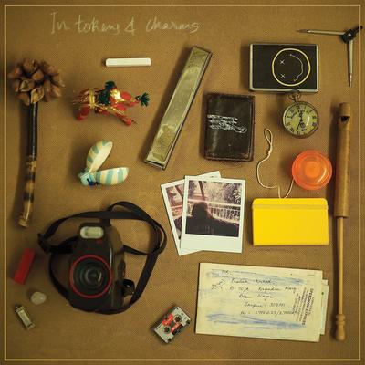 In Tokens & Charms [Deluxe Edition]'s cover