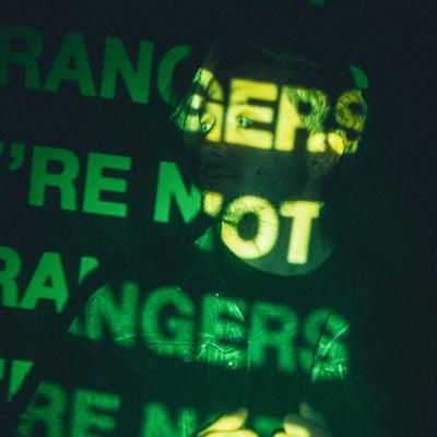 WE'RE NOT STRANGERS's cover