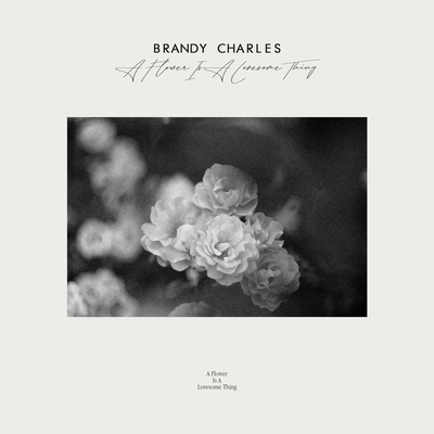 A Flower Is A Lovesome Thing By Brandy Charles's cover