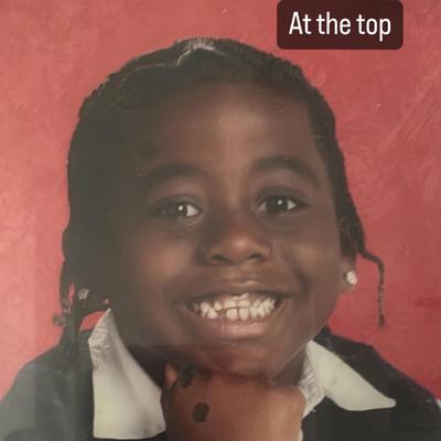 At the top's cover