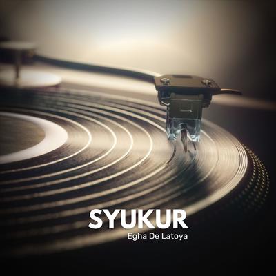 Syukur's cover