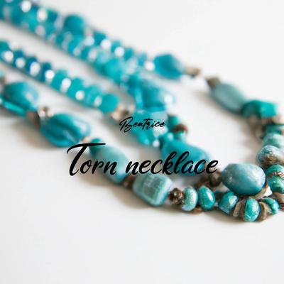 Torn necklace's cover