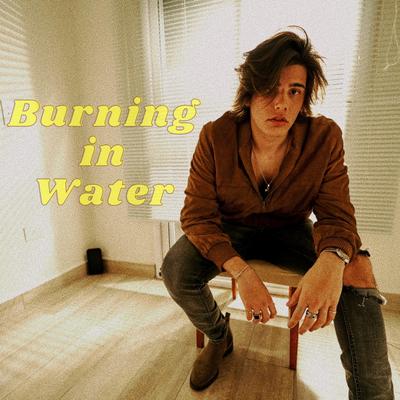 Burning In Water By Tomas Chris's cover